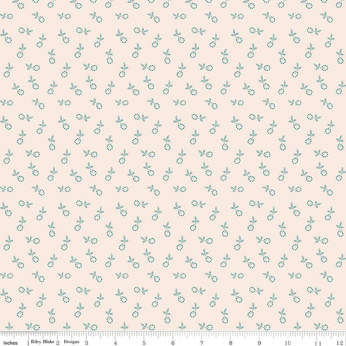 Fabric with small floral pattern on a light pink background