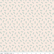 Fabric with small floral pattern on a light pink background