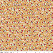 Floral pattern fabric with red and green flowers on a yellow background.