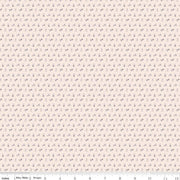 Fabric with small flower pattern on a beige background