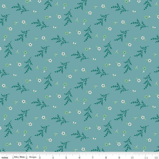 Floral pattern fabric with green leaves and white flowers on a teal background