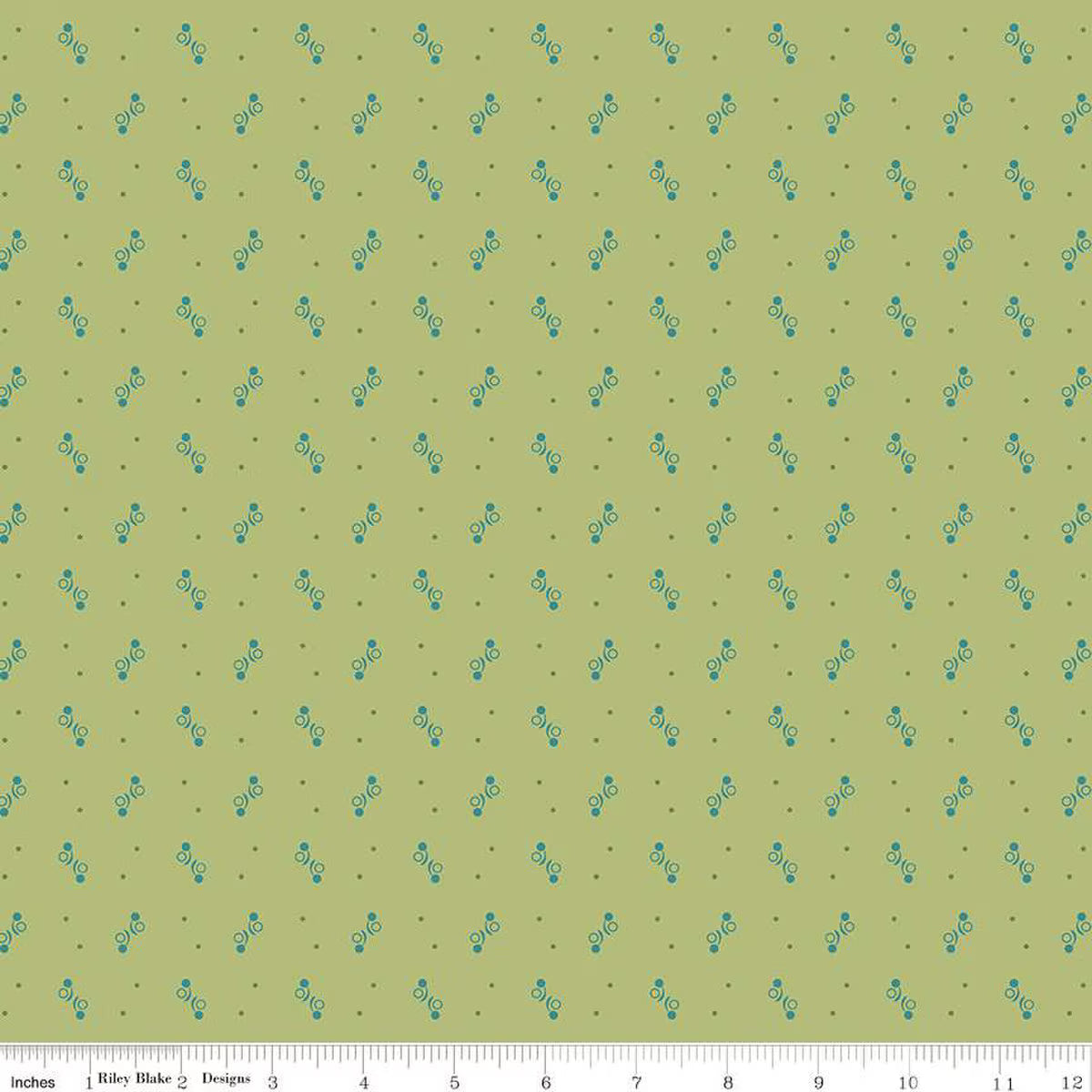 Fabric with geometric pattern on a green background.