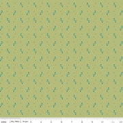 Fabric with geometric pattern on a green background.