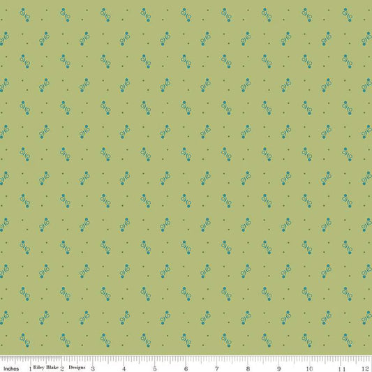 Fabric with geometric pattern on a green background.