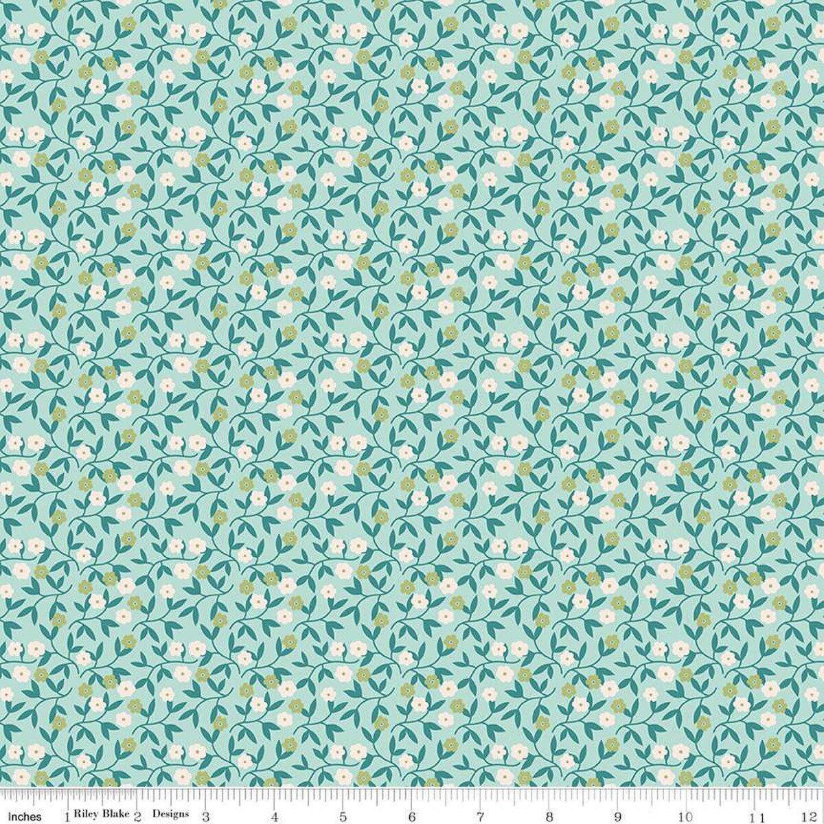 Floral pattern fabric swatch on a light blue background