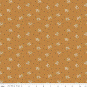 Fabric with small floral pattern on a brown background