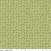 Green fabric with small blue and brown pattern.