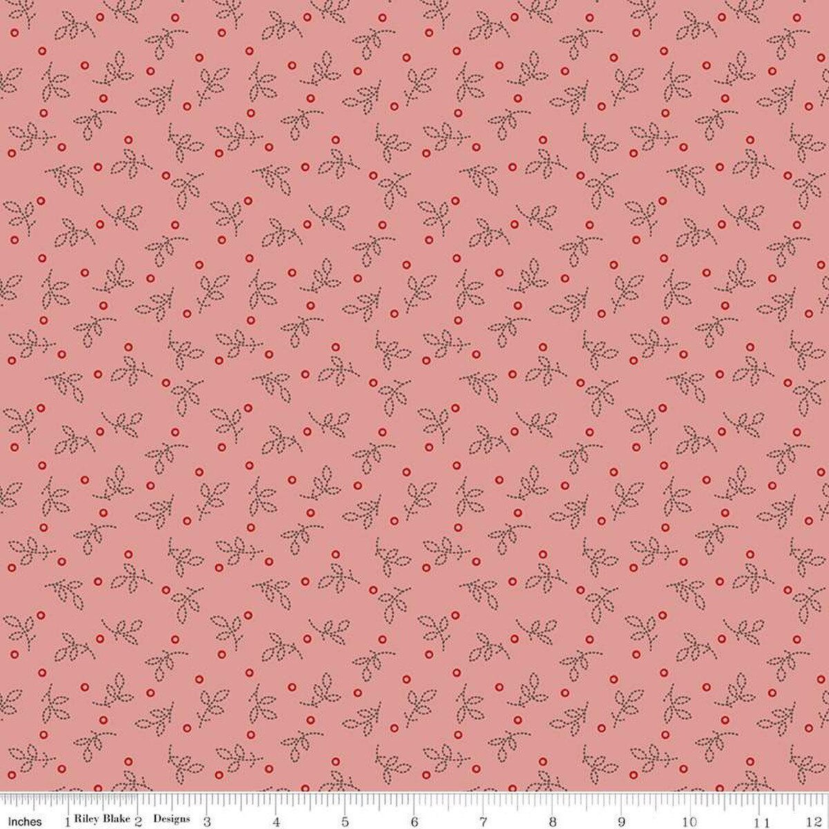 Fabric with a small leaf and berry pattern on a pink background
