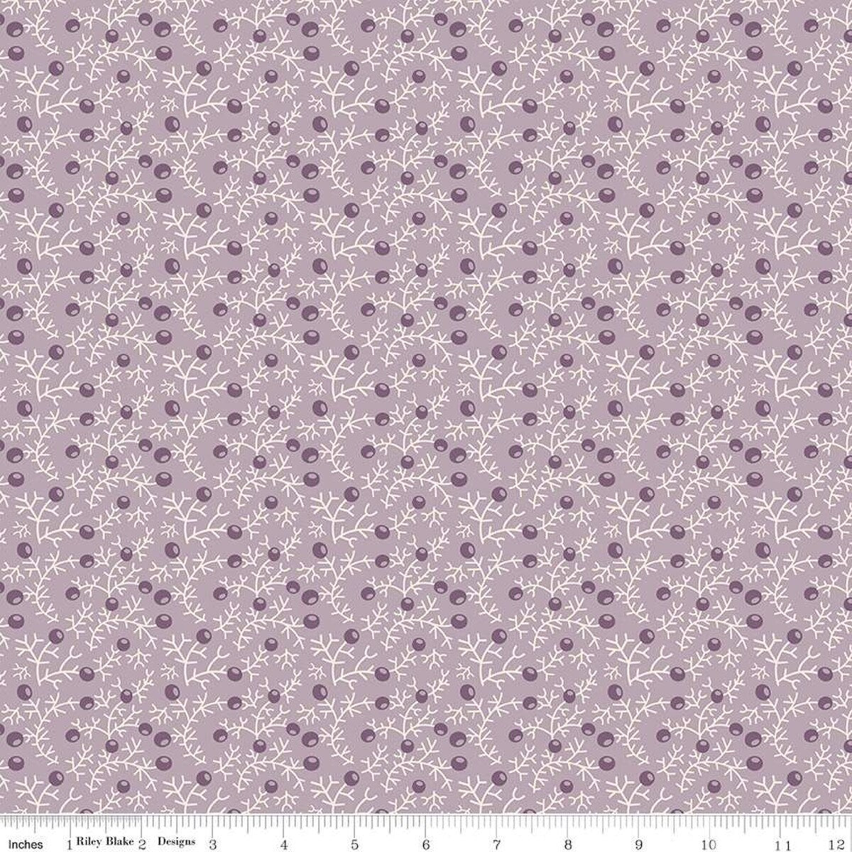 Fabric with small floral pattern on a light purple background