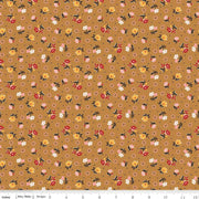 Floral pattern fabric swatch on a brown background