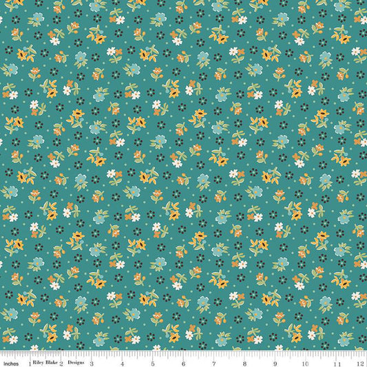 Floral pattern fabric swatch on a teal background