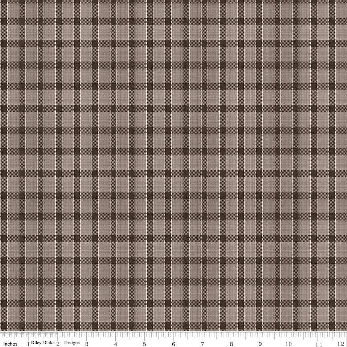 Plaid fabric pattern with brown and beige colors.