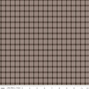 Plaid fabric pattern with brown and beige colors.