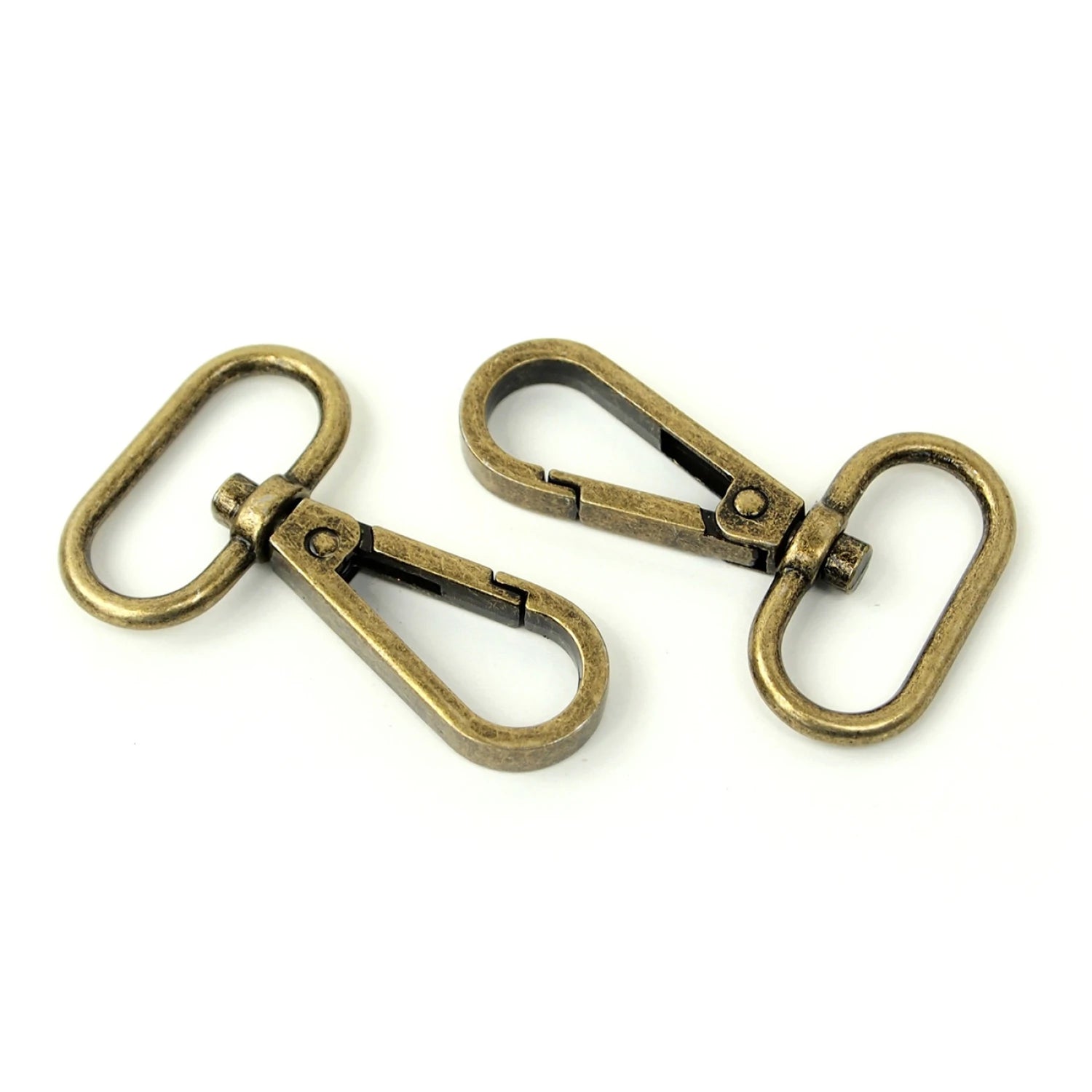 Two Swivel Hooks 1" Antique